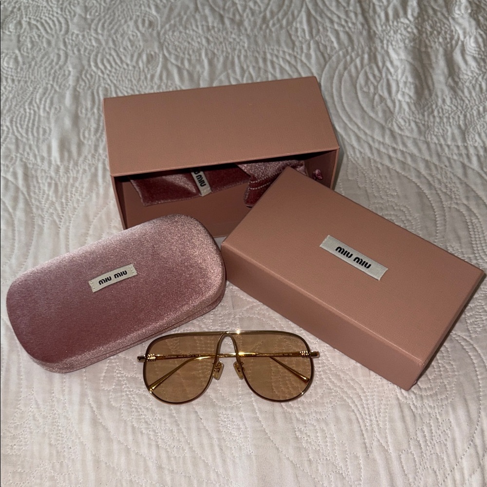 new Miu Miu Gold Aviator Sunglasses